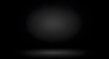 Abstract black background with spotlight effect, empty space for text and object presentation, dark gradient texture for product showcase
