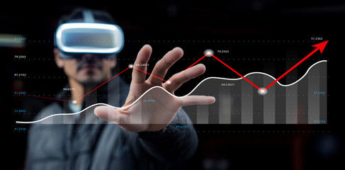 Man using virtual reality headset interacts with digital financial graphs displaying analytics, data trends, and growth projections in modern workspace