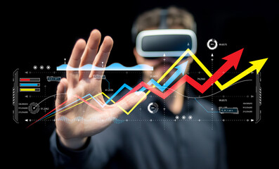 Man in Virtual Reality Headset Using Interactive Graphs and Charts for Data Analysis and Visualization in Futuristic Technology Environment