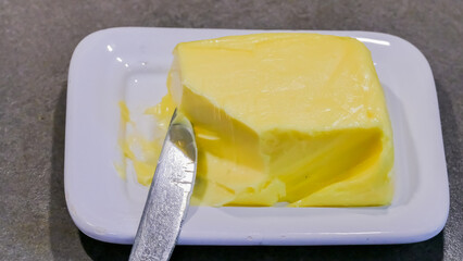 Butter with a knife in close-up