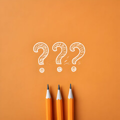 photo of handdrawn white question marks on a bold