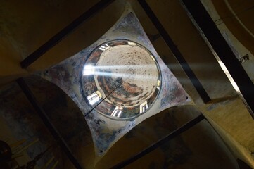 The interior of the church illuminated by the sun's rays