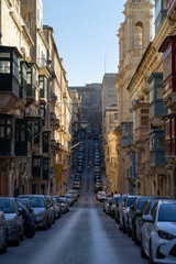 A street in Valletta that goes upfill and creates an illusion of world-bending