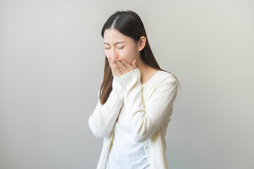 Unhappy pregnant asian young woman, pain girl suffering from nausea, having vomit feeling sick,...