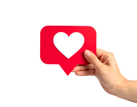 A person's hand holds a vibrant red speech bubble with a heart cutout, symbolizing affection and social connection.