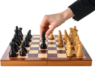 A person's hand strategically moves a black chess on a wooden board, ready for a challenging game.