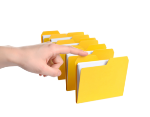 A human hand points to a yellow file folder, symbolizing efficient organization and document management.