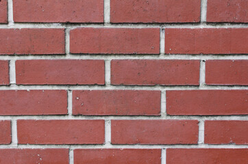 Close up of red brick wall texture background.
