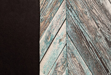 Wallpaper with an old wood texture in pale blue and turquoise tones