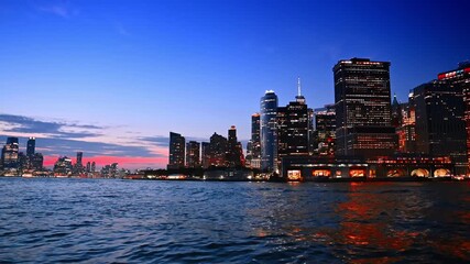 Spectacular scenery of the night city with fantastic illumination. Skyline of New York from the riverscape. - Powered by Adobe