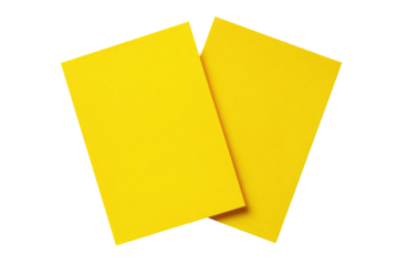 Two bright yellow rectangular cards, slightly overlapping, appear to be warning or caution cards