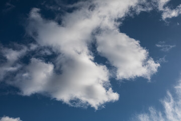Dark blue sky with clouds at early evening
