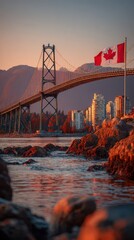 Sunset view of Lions Gate Bridge with Canadian flag in Vancouver, showcasing serene waters and distant mountains