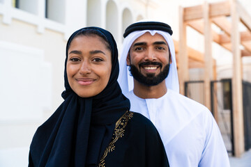 Beautful arab couple wearing emirati clothing portrait
