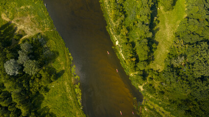 Aerial View of a River with Kayaks in Nowy Lubiel, Poland