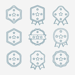 A set of blue star shaped stickers with a ribbon in the middle