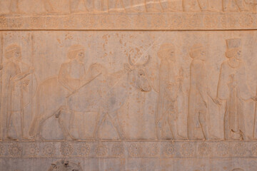 The Walls of Persepolis, in Iran, are decorated with beautiful bas-reliefs, and stone carving. This UNESCO World Heritage Site is a masterpiece of Persian architecture. Persepolis, Iran, 11.27.23.