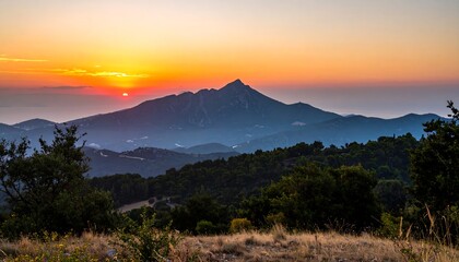Obraz premium Majestic Mountain Silhouette at Sunset, with Golden Sky and Lush Forest