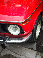 headlight of a red car