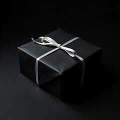 Elegant gift box with red ribbon on plain background.