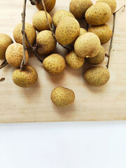 Healthy and Nutritious Longan on a Wooden Surface