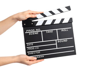 Hands hold a classic film clapperboard, poised to mark the start of a new scene in cinematic production.