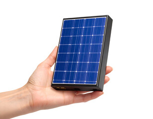 A person's hand gently holds a compact portable solar panel power bank, showcasing renewable energy technology.