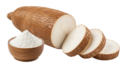 Whole and sliced cassava root with white flour in wooden bowl tuber