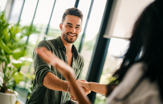 Modern, inclusive, and collaborative atmosphere in the office. They warmly welcome the new colleague