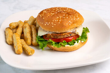 veggie burger   with broccoli fries