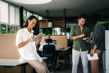 A diverse, talented team collaborates effectively in a bright office space during a business meeting