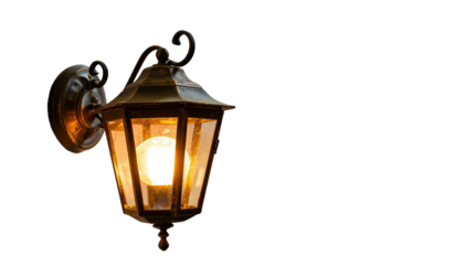 Vintage wall mounted lantern with glowing warm light isolated on white background