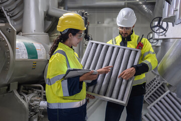 Air Conditioning Control System Check Professional team checking the computer controls and...