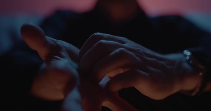 Anxiety and nervousness due to drug addict withdrawal concept video. Man scratching hands nervously with stress. 