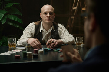 An intense and captivating poker game scene filled with intriguing and diverse characters