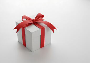 Obraz premium White gift box with red ribbon bow isolated on white background
