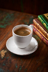 Cup of coffee on wooden background. Soft focus. Copy space	
