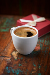 Cup of coffee on wooden background. Soft focus. Copy space	