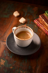 Cup of coffee on wooden background. Soft focus. Copy space	