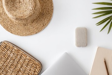 Flatlay Summer travel essentials on white desk