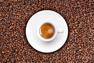 Coffee Cup Top View on Coffee Beans Background