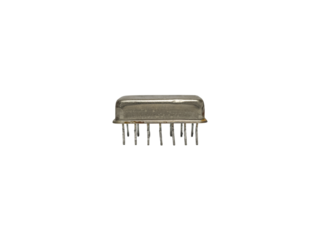 Old integrated circuit in metal DIP package with worn pins is isolated.