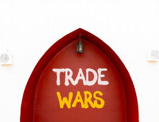 Trade wars symbol. Concept word Trade wars on beautiful white and red wall. Beautiful white and red...