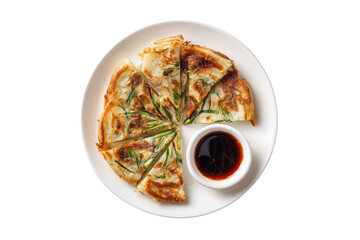 Savory korean scallion pancake with dipping sauce isolated on transparent background