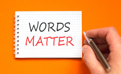 Words matter symbol. Concept word Words matter on beautiful white note. Businessman's hand with...