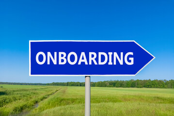 Onboarding success symbol. Concept word Onboarding on beautiful blue road sign. Beautiful blue sky...