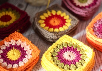 Granny square collection motives different colors flower decor crocheted samples handmade art photo	