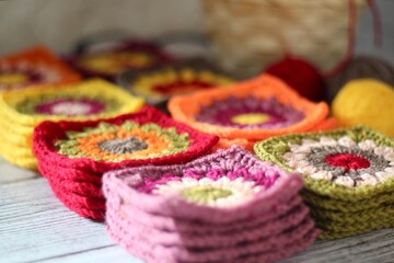 Granny square collection motives different colors flower decor crocheted samples handmade art photo	