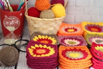 Granny square collection motives different colors flower decor crocheted samples handmade art photo	

