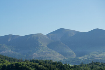 Breath of the Earth: Where Mountains Rest Beneath the Sky
